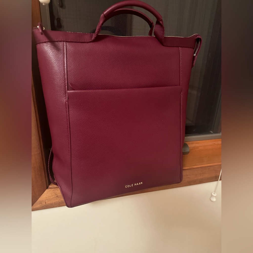 Cole Haan bag with knap sack option. Can be used many ways.